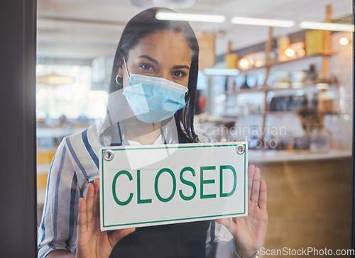 Image of Compliance, safety and economic crisis closing store due to covid19 pandemic, sad and in debt. Small business owner frustrated about fail startup, hanging a sign on the window or entrance of shop