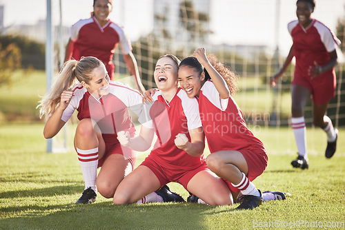 Image of Celebrate, winning and success female football players with fist pump and hurray expression. Soccer team, girls or friends on a field cheering with victory sign, celebrating win in a sports match