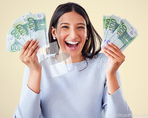 Image of . Money, investment growth and finance success of a happy, excited and smiling woman holding cash. Portrait of a young happy female enjoying her growing financial wealth and savings with a big smile.
