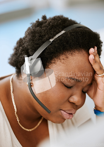 Image of Burnout, headache and stressed female call center agent working with problem, bad mental health or stressful job. Sales representative or advisor feeling overworked, tired and exhausted