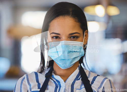 Image of Startup, coffee shop and restaurant cafe businesswoman with covid face mask, entrepreneur, worker or barista. Closeup of professional business owner, manager or employee working after the pandemic