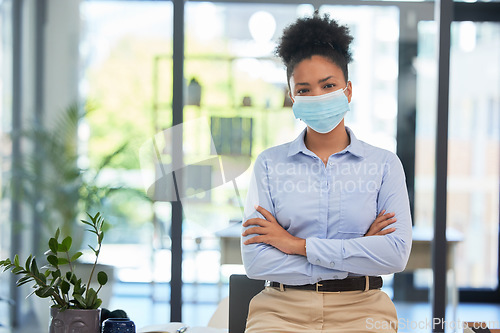 Image of Covid mask policy and safety in the office workplace with businesswoman covering her face during quarantine, lockdown or flu season. Respectful and leadership professional female in a work portrait