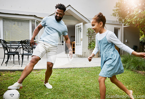 Image of Playing, bonding and having fun in a garden with a smiling father and happy little girl outside. Dad teaching football, learning and showing his daughter how to kick a soccer ball outdoors together