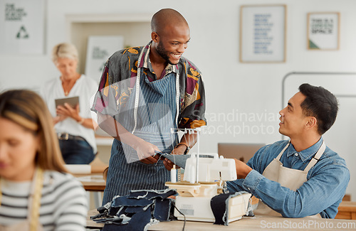 Image of Fashion designers, colleagues and men sewing clothes in a workshop. Happy, diverse and smiling young creatives planning garment designs in a textile, clothing and manufacturing studio or factory