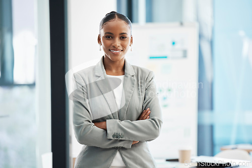 Image of Proud, formal corporate businesswoman with arms crossed showing professional leadership, in marketing strategy presentation. Smiling employee standing in company boardroom for business meeting
