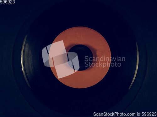 Image of Vintage looking Vinyl on a phonograph rubber platter mat