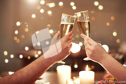 Image of Cheers, toast and celebration for a couple on romantic date night celebrating an anniversary, valentines or a birthday. Closeup of hands holding glasses of champagne, alcohol and booze in restaurant