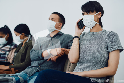Image of Woman calling while traveling with covid and waiting in line at airport while wearing a mask for protection. For hygiene and healthcare security, follow coronavirus social distance regulations