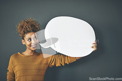 Image of Woman holding speech bubble, chat board and blank copy space poster for voicing opinions, talking on social media or sharing ideas. Creative speaking about marketing strategy, innovation or vision