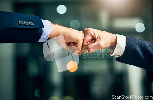 Image of Partnership, teamwork and unity by hands fist bumping in support of a mission or goal. Business partners collaborating on a vision, community planning a strategy to support and succeed together