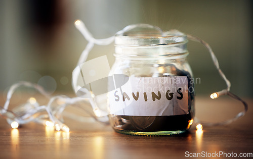 Image of Finance, investment and future planning with a collection of many coins, money in a jar on a table. Retirement fund or growth profit, budget, saving for financial security. Banking on a tax returns