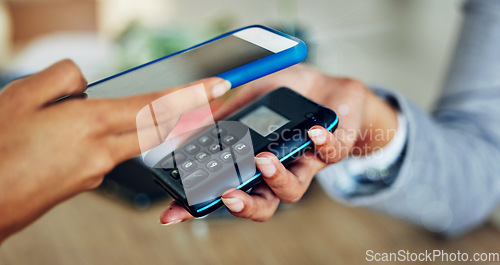 Image of . Customer tapping phone for mobile nfc payment, digital transaction and money transfer for a quick, cashless and contactless sale in a store. Closeup of quick, easy and convenient retail shopping.