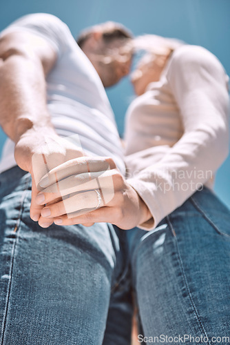 Image of Engagement, romance and in love couple holding hands with ring on finger while celebrating relationship anniversary, wedding or honeymoon together outdoors. Below of husband and wife showing love