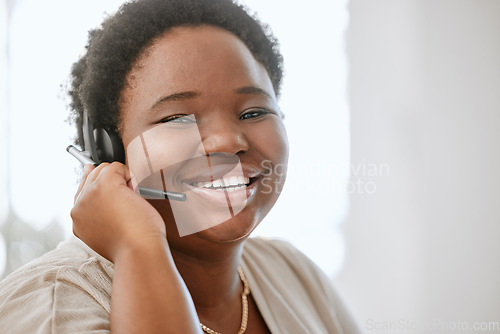 Image of Happy, confident and professional call center agent or business consultant working in telesales on call with headset. For good customer service success, contact us for online faq helpdesk support.