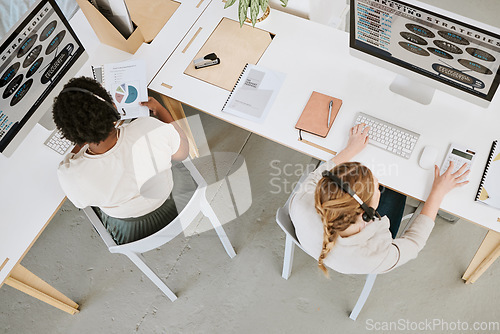 Image of Marketing strategy, customer service and female office team working on a computer indoors. Female advertising staff planning a web work research project together with headsets inside