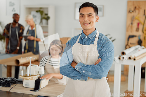 Image of Proud clothing factory manufacturing manager portrait inside office. Small business owner of workshop feeling satisfied with his career choice. Entrepreneur, happiness and leadership with a smile.