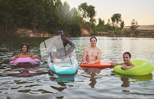 Image of Friends swimming, relax and enjoy fun summer vacation, holiday or trip to a lake portrait. Young, diverse and traveling men and woman on a youth, camp and adventure lifestyle retreat