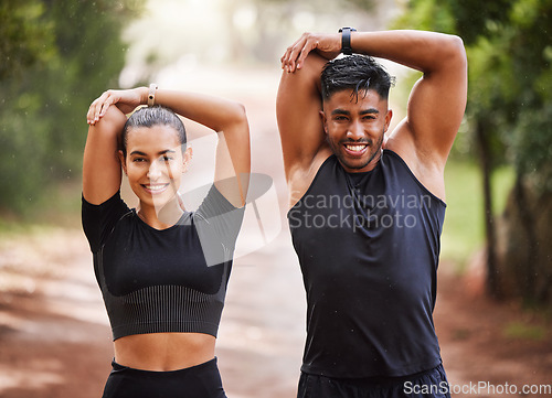 Image of Fit couple or active, athlete friends stretching arms for exercise warmup outdoors in forest. Workout partners or smiling joggers about to run or do cardio training for health and wellness lifestyle.