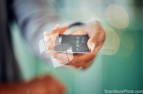 Image of . Female hand holding a credit card to pay her debt, loans and mortgage at the bank during inflation. Closeup of a woman paying her financial bills. Lady making an investment in savings account.