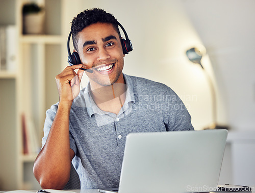 Image of . Friendly call center, online or tech support worker who helps clients, customers and callers. Man on a laptop, with a headset and working as a customer service professional from home portrait.