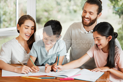 Image of Learning, education and homework with a family writing, drawing and studying together on a table at home. Parents and children bonding and spending time together while feeling happy and carefree