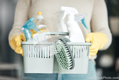 Image of Closeup of house cleaning supplies, floor scrubbing and washing tools or products in an organized basket. Cleaner, housekeeper or maid with spray bottles and hygiene equipment for work or chores