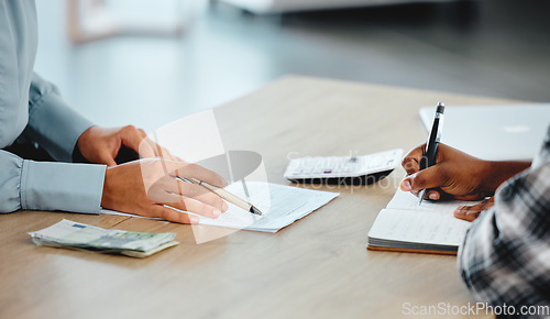 Image of Closeup of a team of finance employees calculating company business budget, expenses and bills. Professional administration or financial workers working together, planning and writing down a list