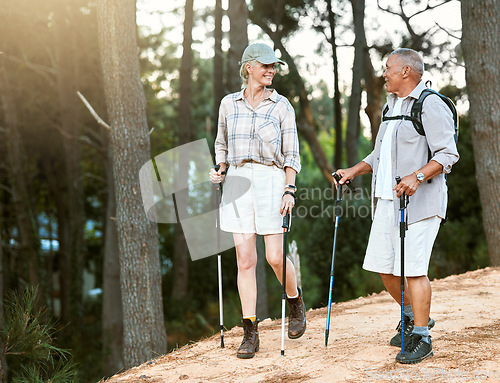 Image of Hiking, adventure and exploring with a senior couple or friends having fun, exercising and enjoying the outdoors. Walking, discovering and journey with old people talking in nature, forest or woods