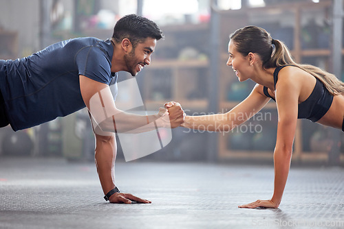 Image of Support, teamwork and fitness couple doing workout training, challenging exercise for endurance, strength and stamina in a gym. Active, fit man and woman giving support and motivation during pushup