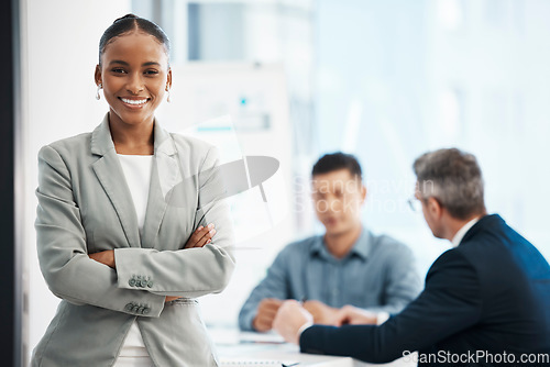 Image of Assistant, intern andor training business woman looking proud, confident and motivated before a boardroom team meeting. Portrait of powerful, ambitious and inspired office corporate with arms crossed