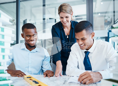 Image of Architects or corporate engineers working on building construction in meeting, planning blueprint and looking at home renovation paperwork. Smiling colleagues drawing a design, doing job and laughing