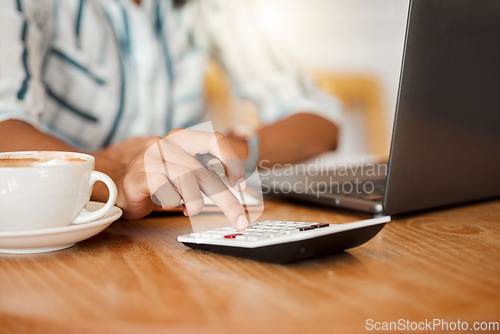 Image of Calculation, budget and finances of hands working with calculator and laptop at a cafe. Finance, costs and income of an accountant calculating or planning financial profits and expenses.