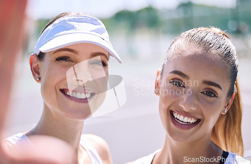 Image of Selfie of smiling, tennis and active women looking happy after a successful sporty match outdoor in the summer sunlight. Excited friends with big smile on face enjoying a friendly day on the court