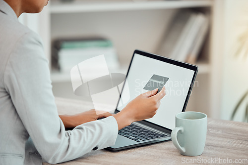 Image of Business woman, finance advisor and accountant shopping online with blank laptop and credit card in an office. Closeup of trader paying, budget and spending money with banking transfer for ecommerce