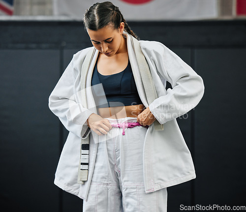 Image of . Karate woman ready for fitness workout at gym, learning at a sport club and doing training exercise at a wellness school or studio. Female dojo student preparing for fighting competition at center.