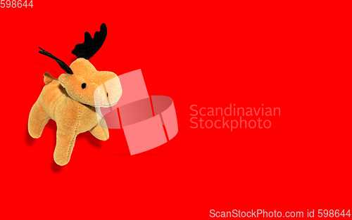 Image of Christmas Deer over red background