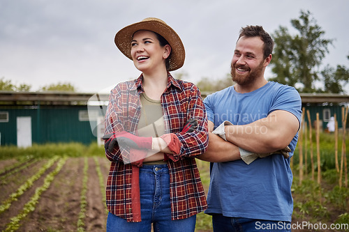 Image of Sustainability, agriculture and farmer couple on a farm growing vegetable crops, enjoying a clean eco friendly environment. Happy rustic people, man and woman with vision for sustainable development