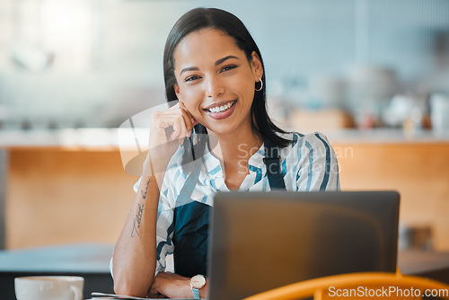 Image of Cafe manager with laptop, vision and motivation checking small business online orders on technology for a local coffee shop. Portrait of happy restaurant entrepreneur managing workers and ecommerce