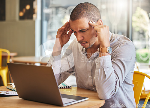 Image of Work, anxiety and a stress headache, man on a computer at his office desk. Employee having a burnout and working, thinking about debt or a deadline. Tired businessman online on laptop with head pain.