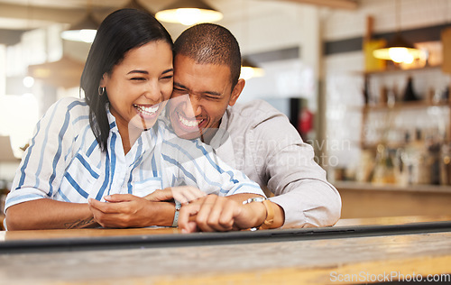 Image of Couple laughing at funny joke at restaurant, boyfriend and girlfriend bonding with smile on romantic date and celebrating anniversary at coffee shop. Husband and wife showing love, having fun at cafe