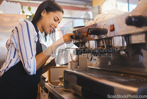 Image of Coffee shop, cafe and restaurant with a barista working as a startup entrepreneur and small business owner. Waitress or server giving service with a smile while at work in a modern and trendy bistro