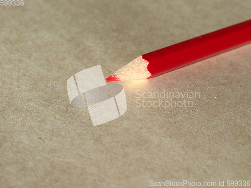 Image of Red pencil over paper