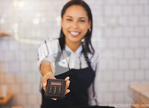 Image of Payment, card reader and money with a friendly coffee shop employee or cafe worker holding a scanner to service an order. Tap to pay, nfc and simple technology to purchase, buy or make a purchase