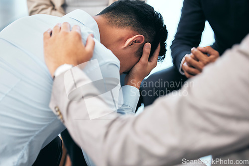 Image of Support and empathy for suffering from mental health, .anxiety and depression businessman in group therapy. Love, care and trust from friends or coworkers for sad man in stress and pain from bad news