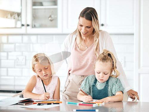 Image of Education, learning and homework with a girl, her sister and their mom in the kitchen at home. Single mother helping, assisting and teaching her daughter with school, studying and coloring or drawing