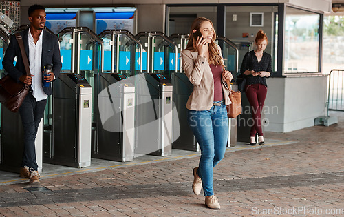 Image of Business woman talking on phone call, commuting on training or bus and walking in urban city. Happy person with smile making conversation, calling a taxi cab and connecting with people online in town