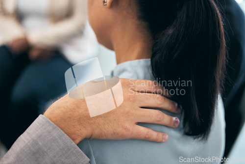 Image of Hands comfort, empathy and shoulder closeup for person in support meeting. Trauma, depression or anxiety workshop for struggling people. Mental health, unity and trust in group convention or team.