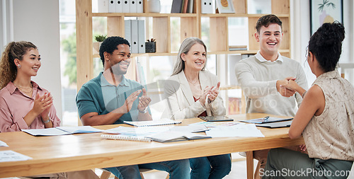 Image of Interview, hiring and business of a creative team in a welcome meeting handshake and thank you for job. Diversity, teamwork and corporate group celebration in recruitment or success of new employee.