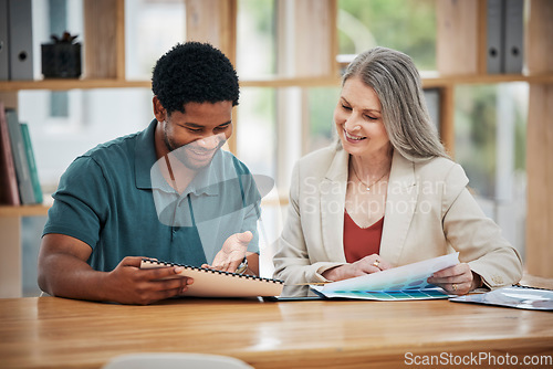 Image of Female leader, manager or boss meeting with an employee, colleague or project leader to discuss a project or report in the boardroom. Business man and woman talking about growth and development