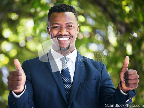 Image of Thumbs up, success and businessman happy, satisfied and excited about job opportunity or goal. Portrait of a black entrepreneur feeling like a winner, saying thank you and sharing motivation outside